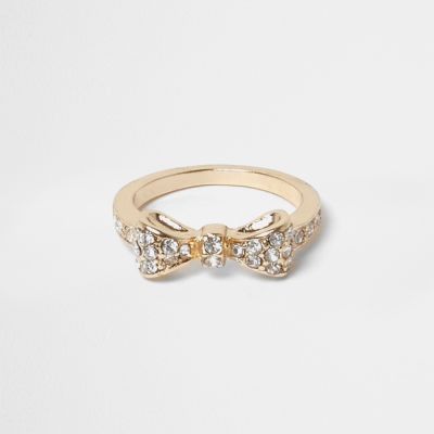 Gold tone gem encrusted bow ring